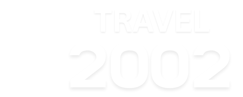 Logo Travel 2002 Putih